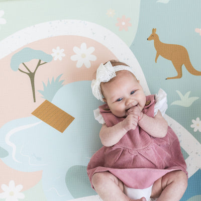 Baby on foam playmat